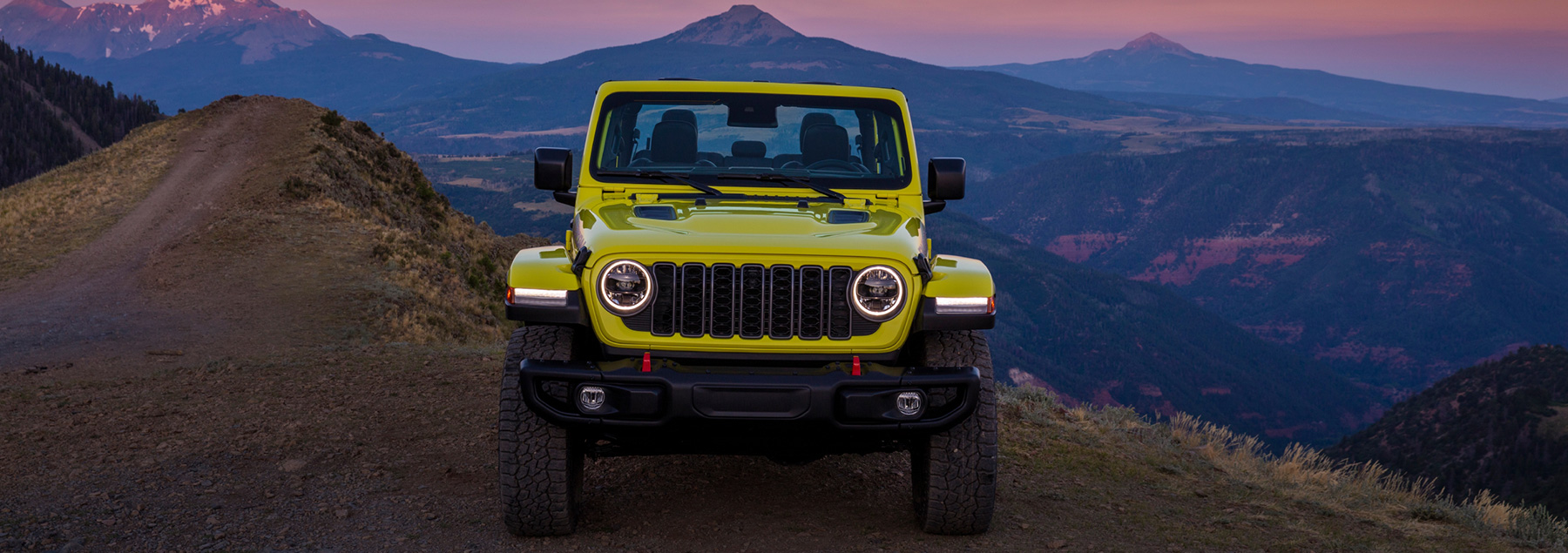 A 2024 Jeep Gladiator standing on a mountain. 